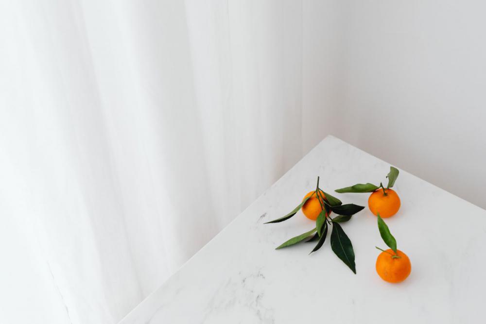 Mandarins on white marble Mandarins on white marble