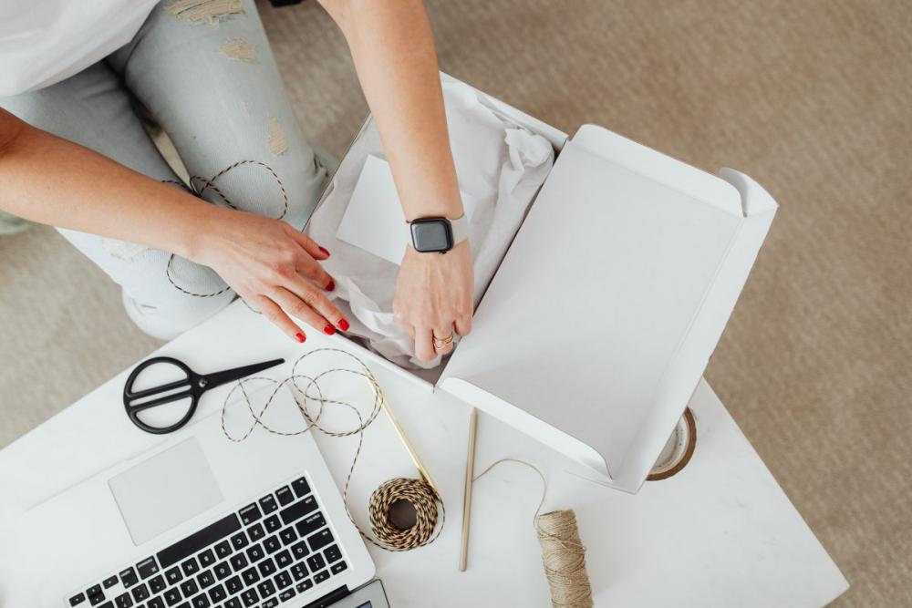 Woman working online e-commerce shopping at her home Woman working online e-commerce shopping at her home