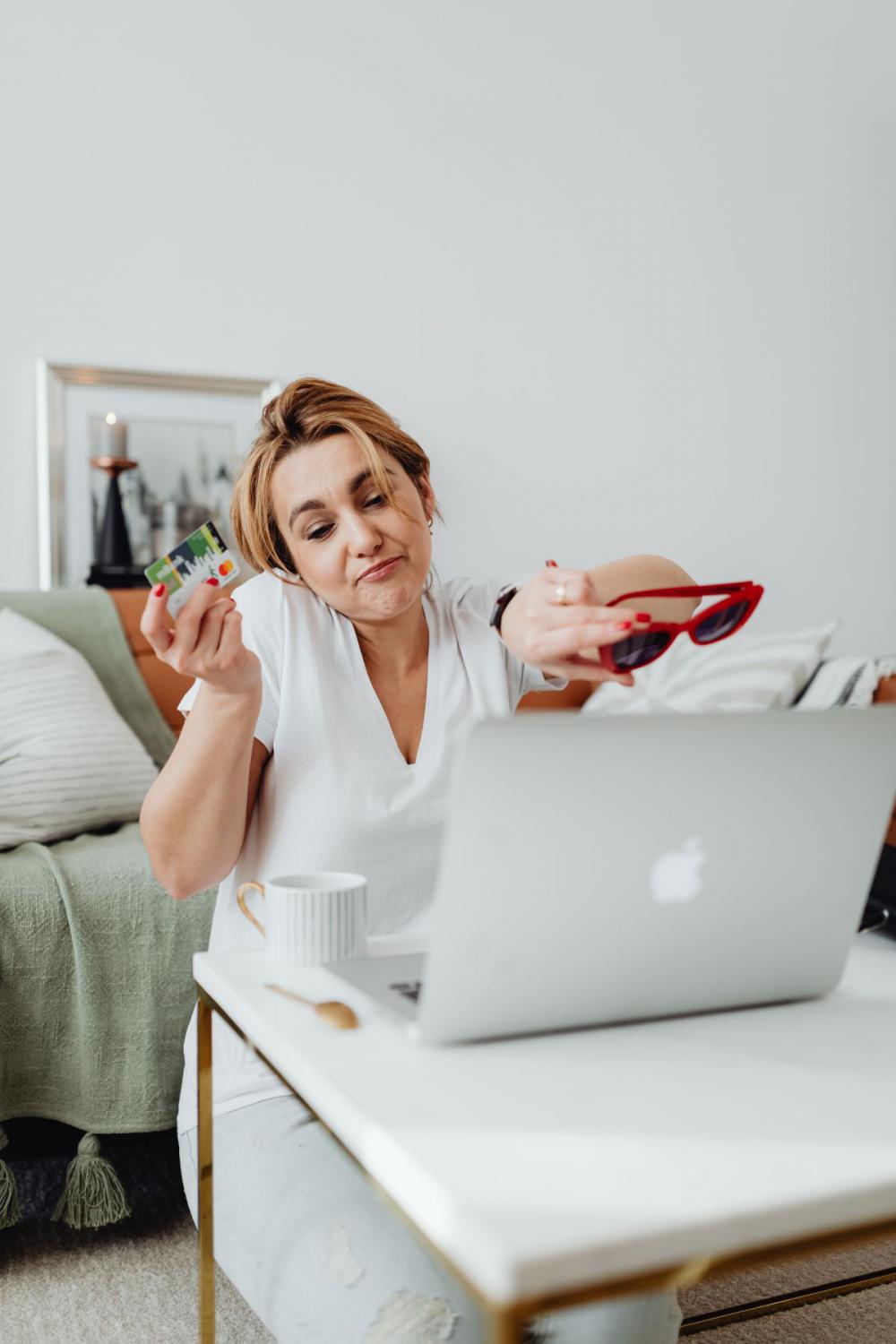 Woman working online e-commerce shopping at her home Woman working online e-commerce shopping at her home