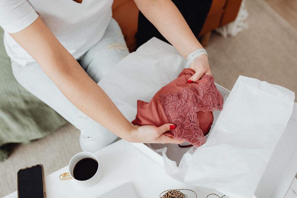 Woman working online e-commerce shopping at her home Woman working online e-commerce shopping at her home