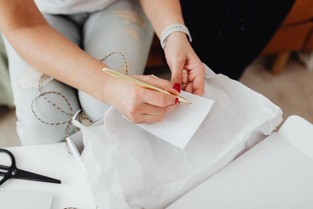 Woman working online e-commerce shopping at her home Woman working online e-commerce shopping at her home
