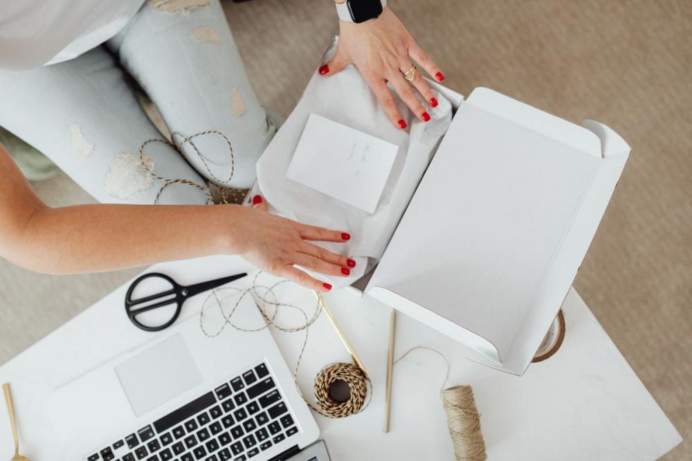 Woman working online e-commerce shopping at her home Woman working online e-commerce shopping at her home