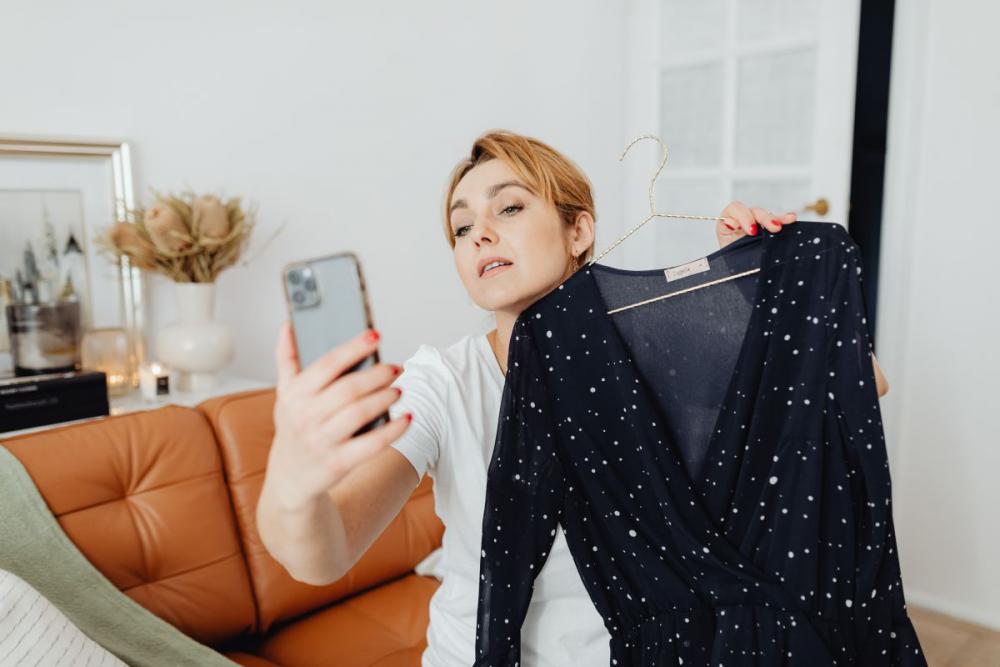 Woman working online e-commerce shopping at her home Woman working online e-commerce shopping at her home