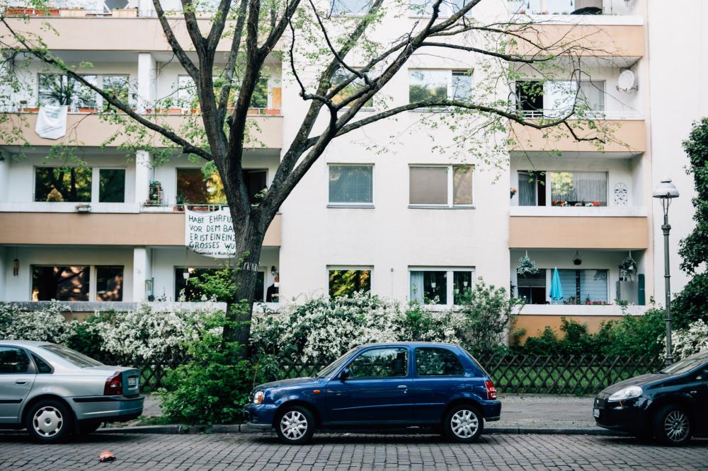 Three Cars Are Parked On Stone Paved Street Photo Three Cars Are Parked On Stone Paved Street Photo