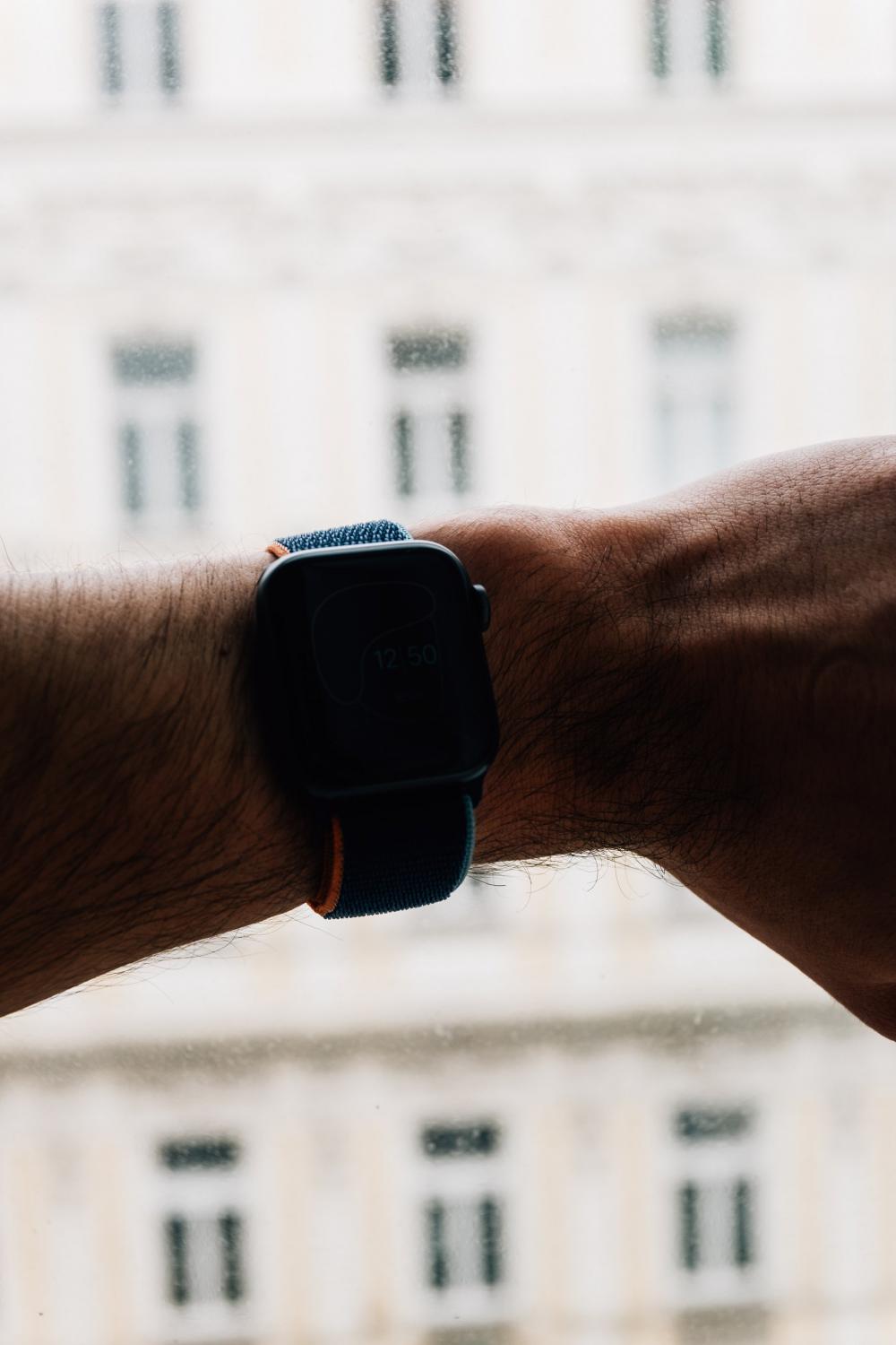 An Arm Wearing A Smartwatch Is Backlit By Window Light Photo An Arm Wearing A Smartwatch Is Backlit By Window Light Photo