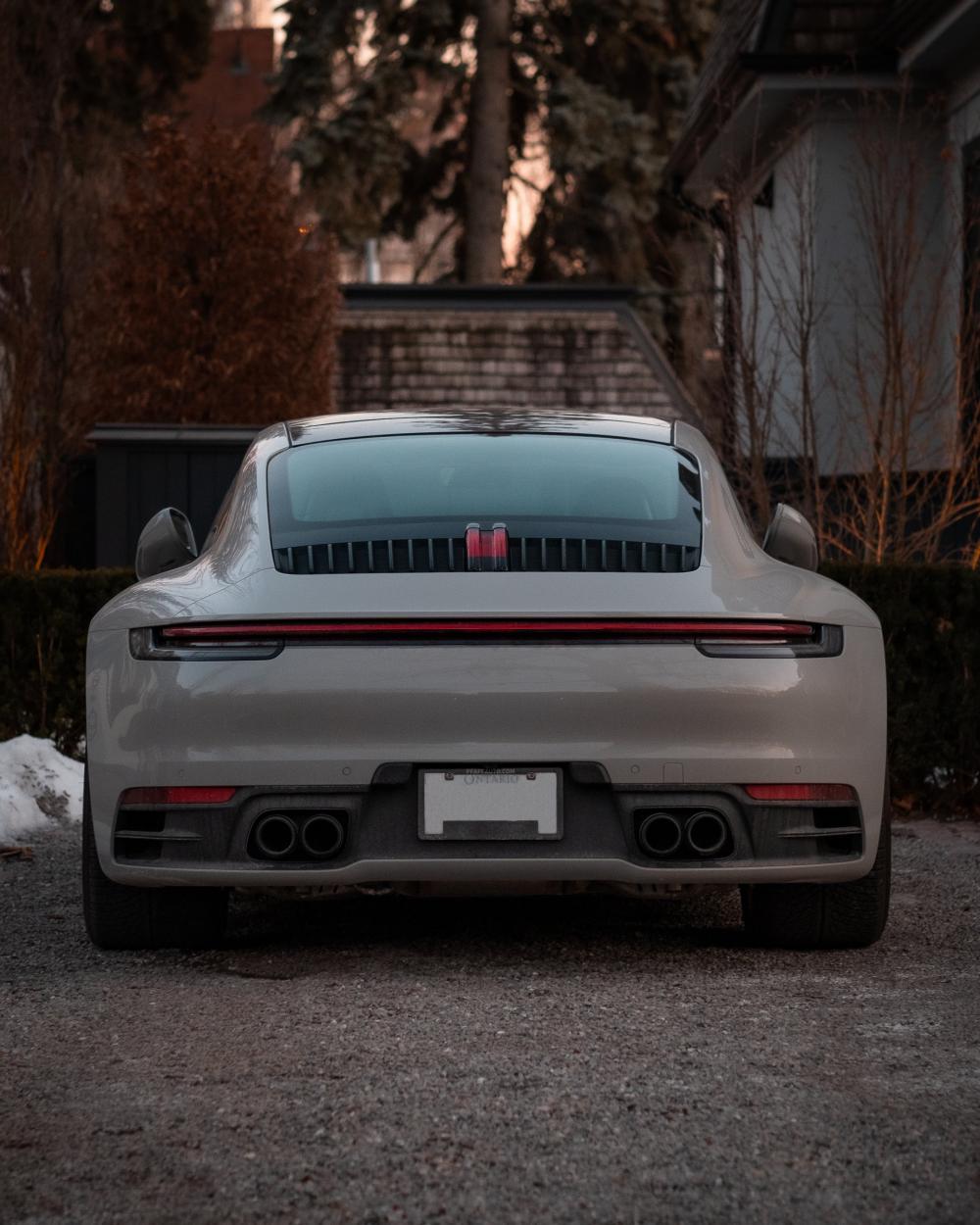 Back Of A Grey Sports Car With Red Detail Photo Back Of A Grey Sports Car With Red Detail Photo