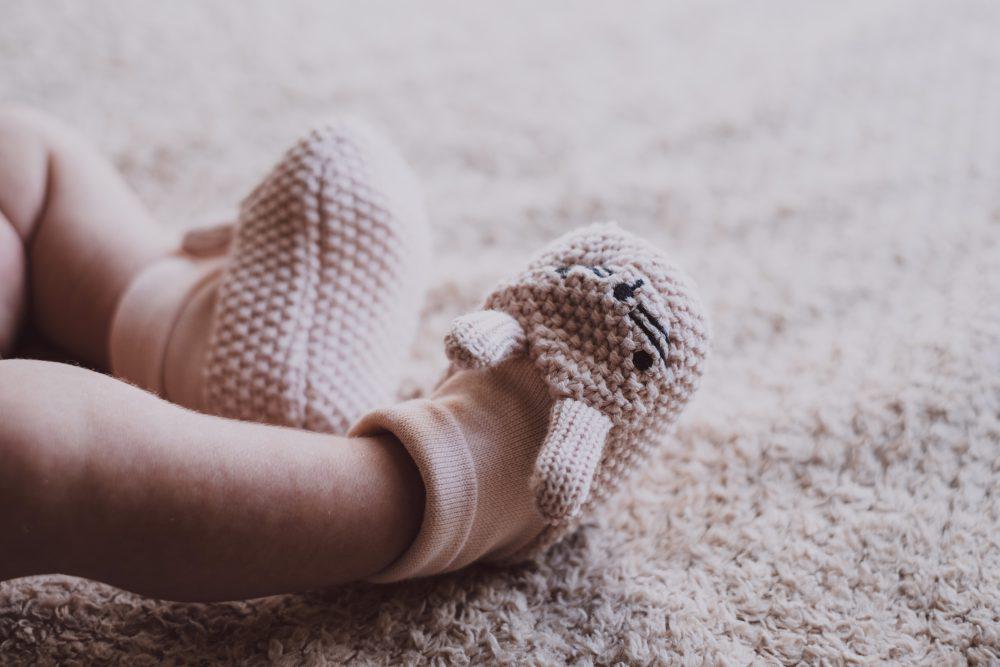 Bunny slippers on newborn’s feet 2 Bunny slippers on newborn’s feet 2