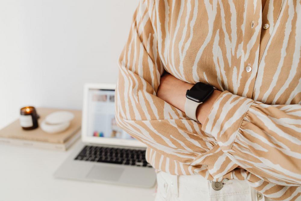 A woman works at her desk - home office A woman works at her desk - home office
