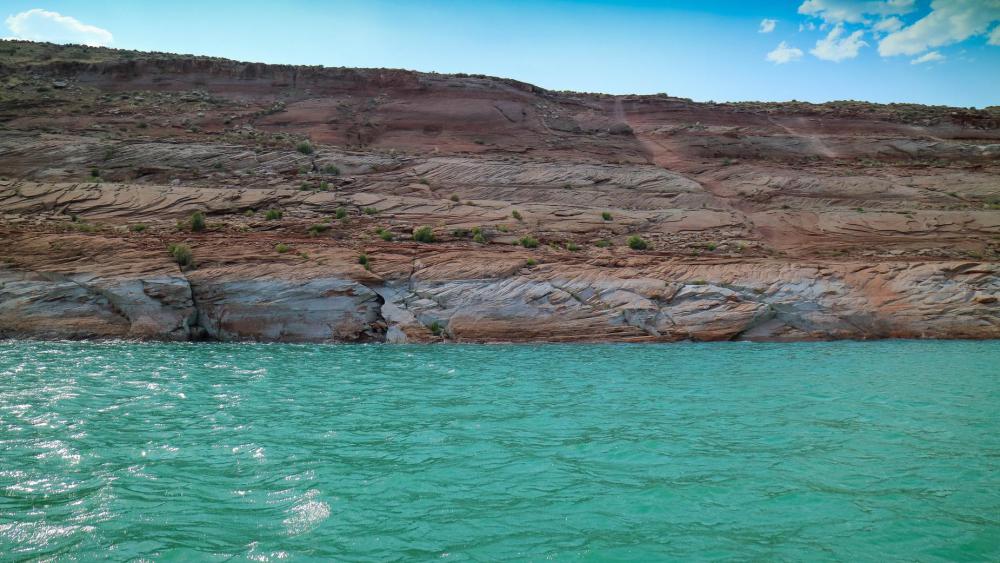 Vibrant Aqua Blue Water Below Cliff Edge Photo Vibrant Aqua Blue Water Below Cliff Edge Photo