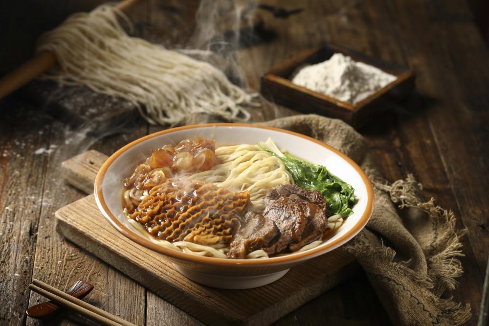 Bowl Of Noodle Soup With More Ingredients Behind Photo Bowl Of Noodle Soup With More Ingredients Behind Photo