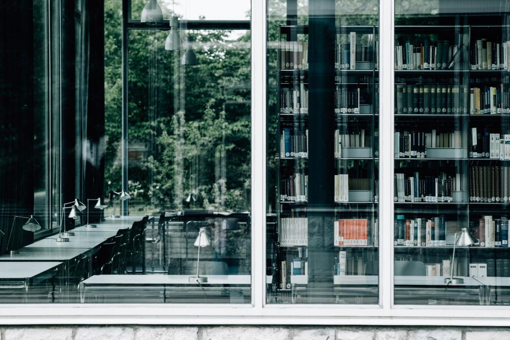 Large Window With Books And Tables Inside Photo Large Window With Books And Tables Inside Photo