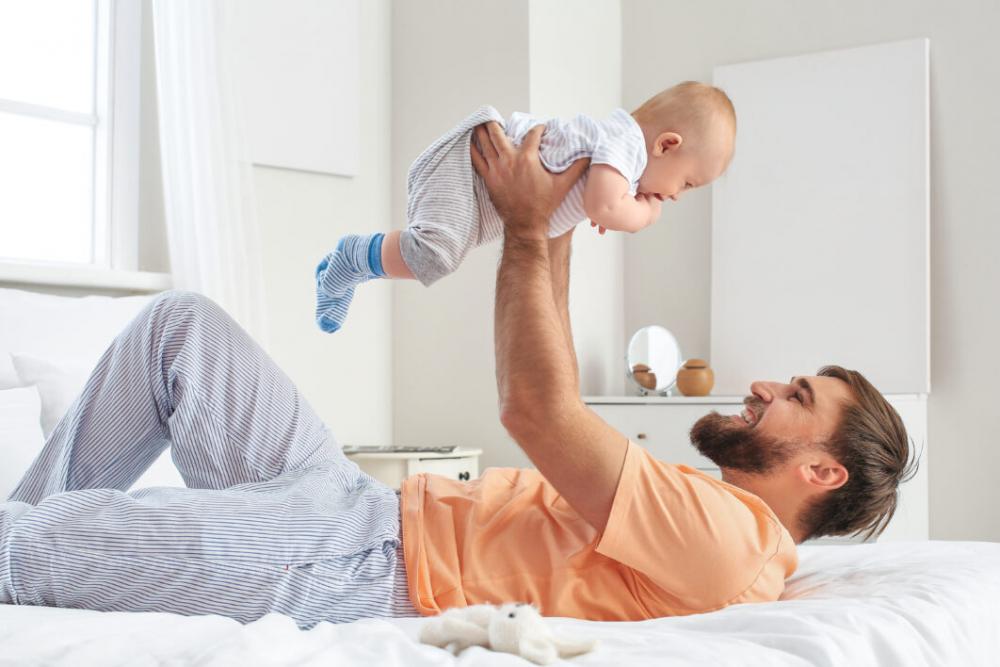 Father and Baby Playing Free Photo Father and Baby Playing Free Photo