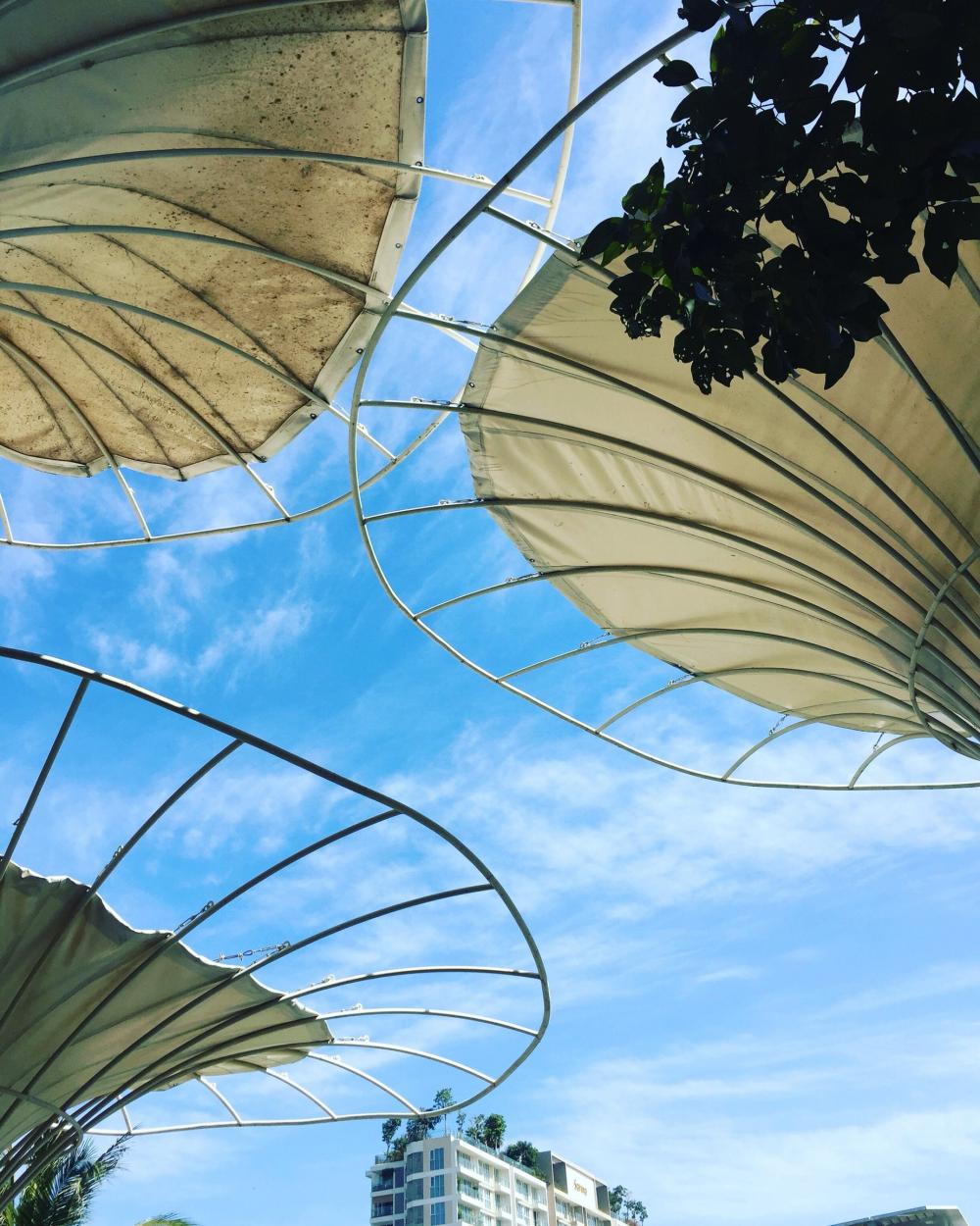 Circular Metal Structure Against A Blue Sky Photo Circular Metal Structure Against A Blue Sky Photo