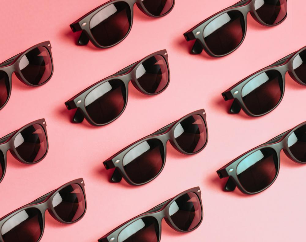 Pattern Of Black Sunglasses On Pink Photo Pattern Of Black Sunglasses On Pink Photo