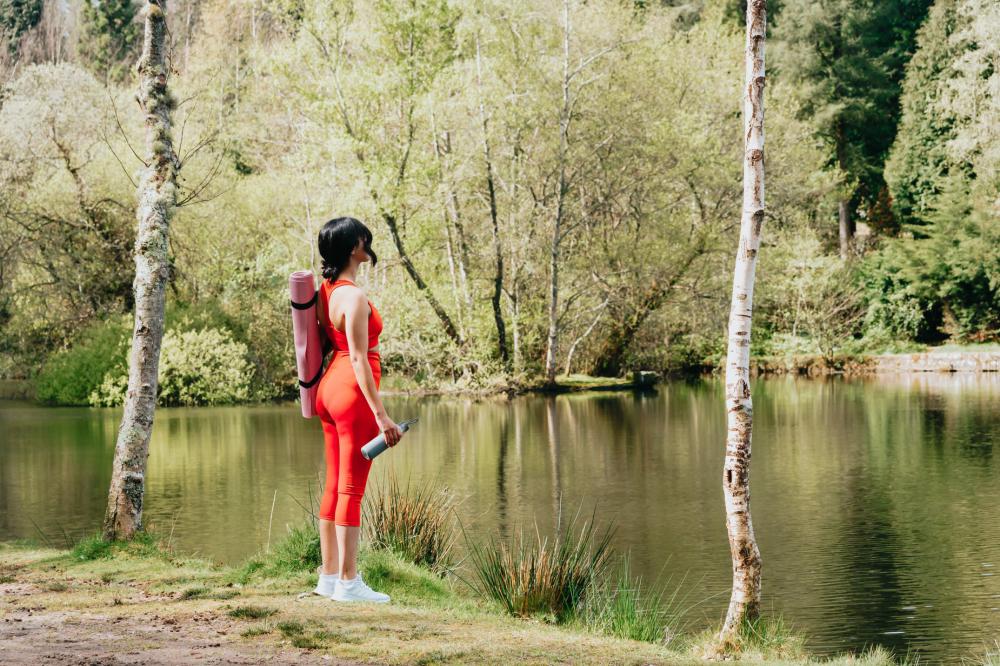 Looking Out At A Pond While Wearing Athletic Wear Photo Looking Out At A Pond While Wearing Athletic Wear Photo