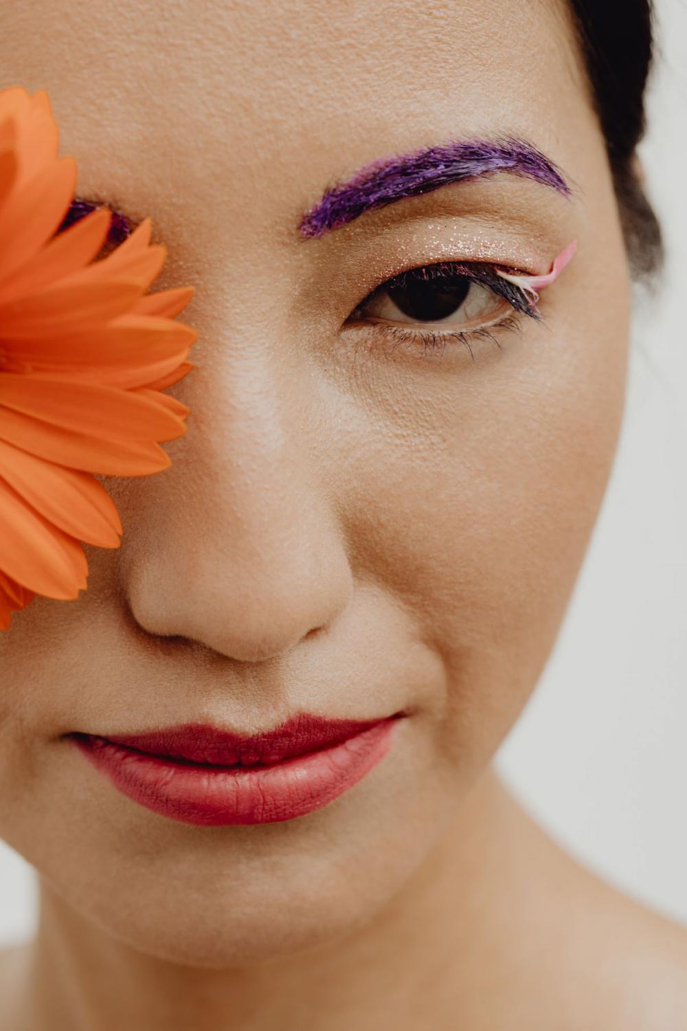 Sensual Portrait Of A Asian Woman With Flowers On Her Face Sensual Portrait Of A Asian Woman With Flowers On Her Face