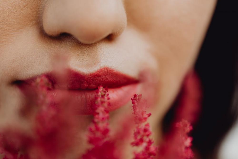 Sensual Portrait Of A Asian Woman With Flowers On Her Face Sensual Portrait Of A Asian Woman With Flowers On Her Face