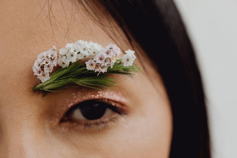 Sensual Portrait Of A Asian Woman With Flowers On Her Face Sensual Portrait Of A Asian Woman With Flowers On Her Face