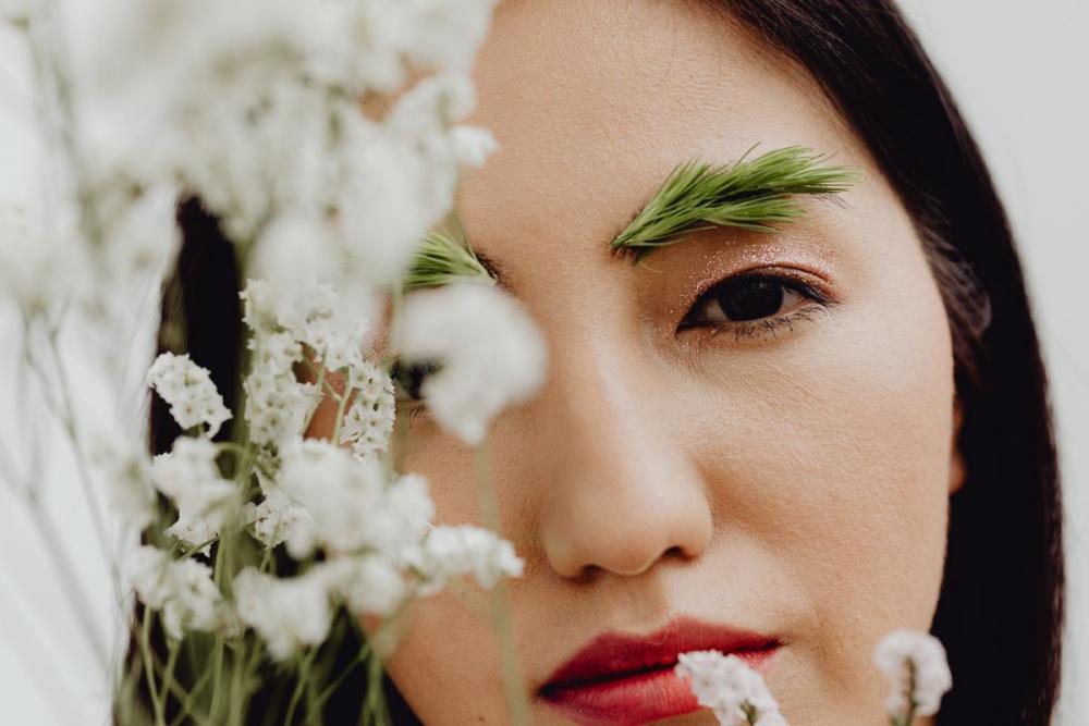 Sensual Portrait Of A Asian Woman With Flowers On Her Face Sensual Portrait Of A Asian Woman With Flowers On Her Face