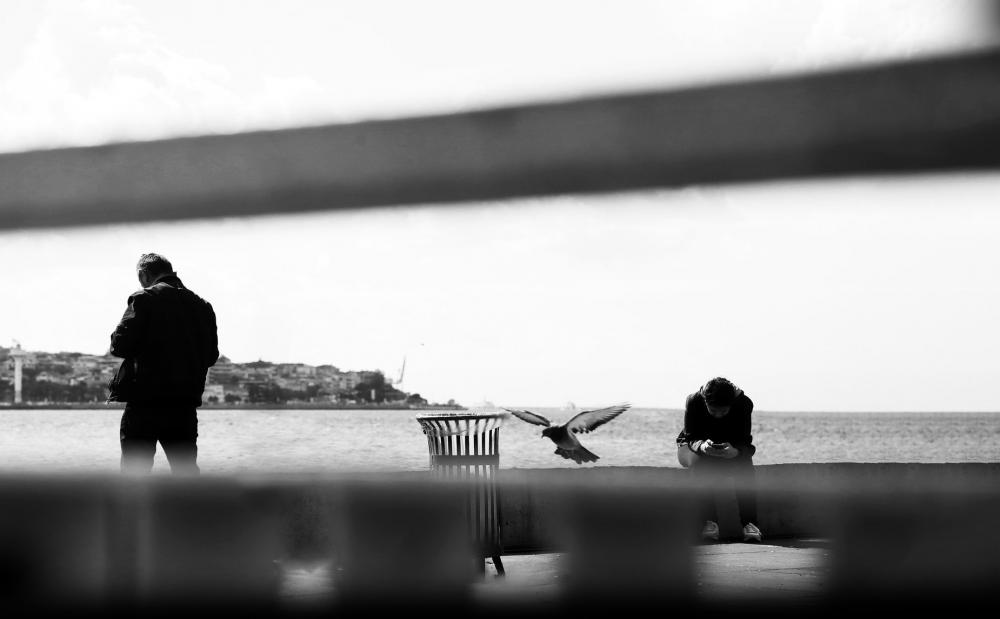 People Viewed Through Blurry Bars In Black And White Photo People Viewed Through Blurry Bars In Black And White Photo