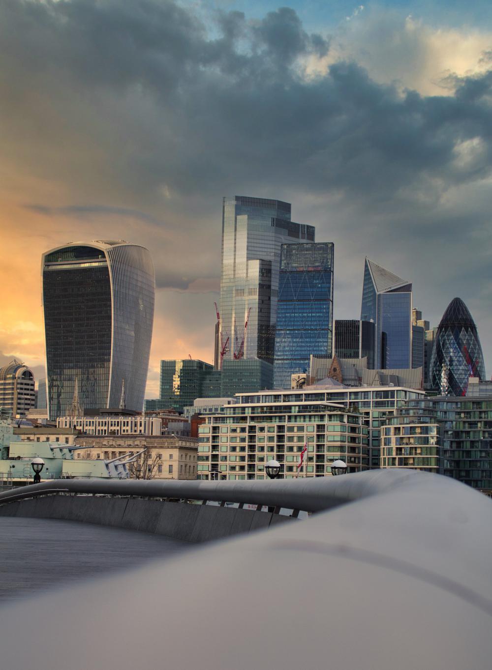 London Cityscape At Cloudy Sunset With Glass Buildings Photo London Cityscape At Cloudy Sunset With Glass Buildings Photo