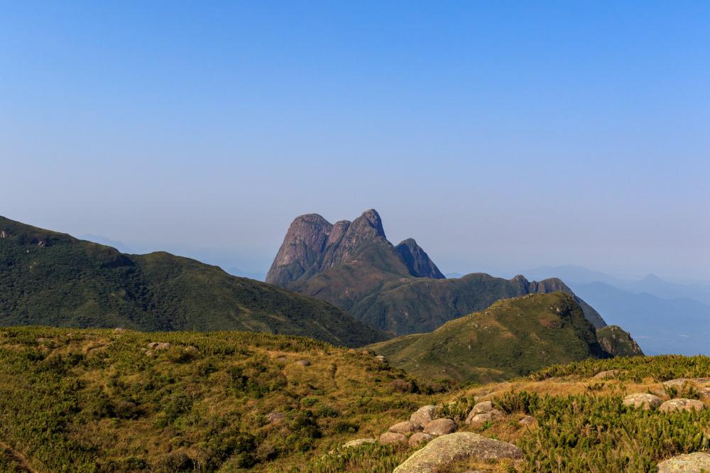 Landscape Of Green Rolling Hills And Mountain Peaks Photo Landscape Of Green Rolling Hills And Mountain Peaks Photo
