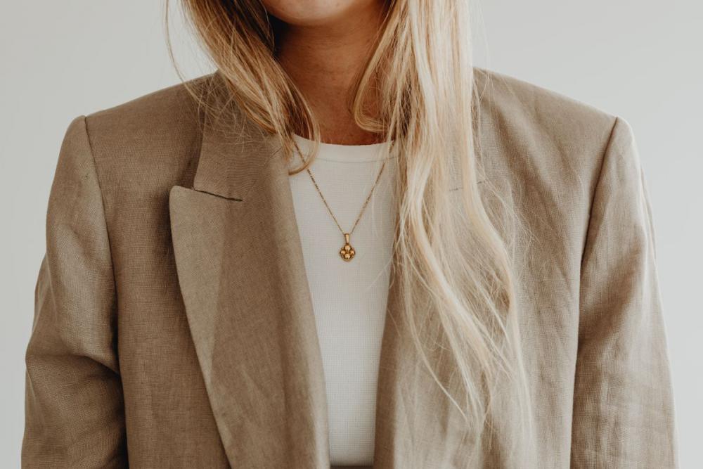 Woman wearing white elegant shorts and linen oversize jacket Woman wearing white elegant shorts and linen oversize jacket