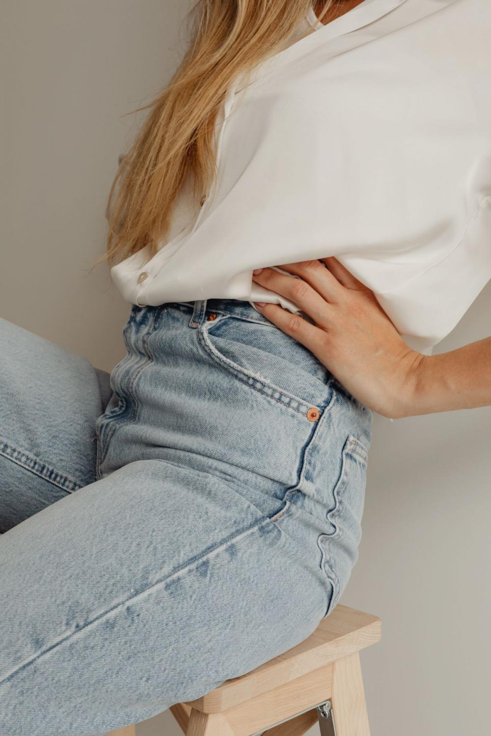 Stylish woman in high waisted wide leg jeans Stylish woman in high waisted wide leg jeans