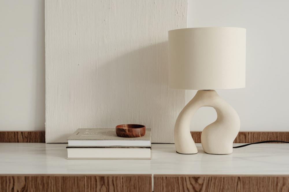 Ceramic lamp styled on a commode with a stone top Ceramic lamp styled on a commode with a stone top