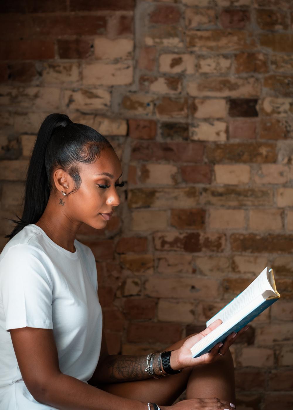 Profile Of A Woman Reading A Book Photo Profile Of A Woman Reading A Book Photo