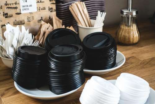 Black paper cup lids for takeaway coffee