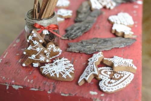 Bunch of traditional Christmas gingerbread on red wood