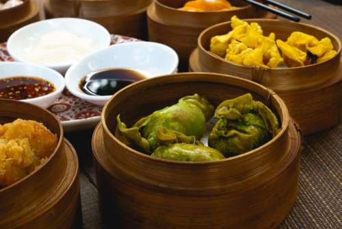 Chinese fried dim sum in wooden steamers