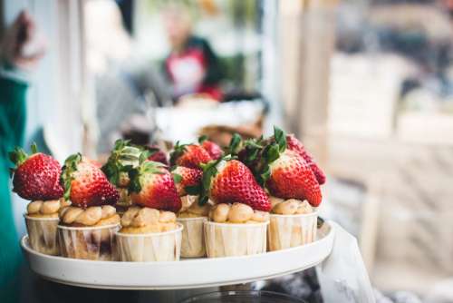 Cupcakes with strawberries on top