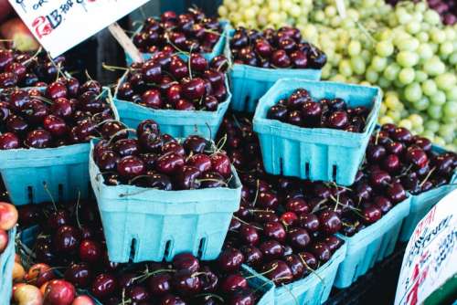 Dark red cherries on a market