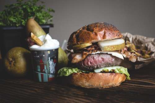 Delicious burger with pears and bacon