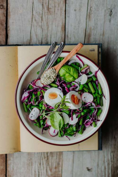 Healthy green beans salad with egg and hemp seeds