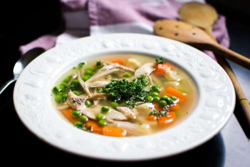 Homemade chicken broth with vegetables