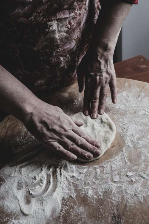 Man processing dough