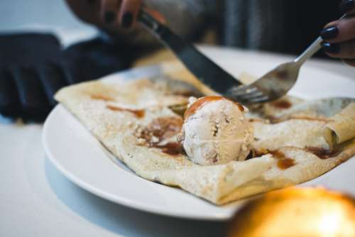Pancakes with hot caramel and ice cream
