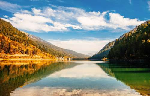 Serene landscape of the Mountains and lake with sky free photo