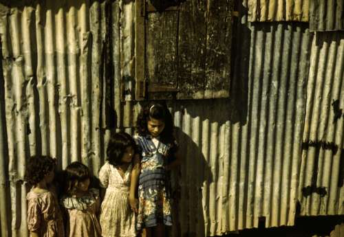 Children in a company housing settlement, 1941 free photo