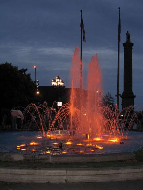 Colored Water Fountain at night in Montreal, Quebec, Canada free photo