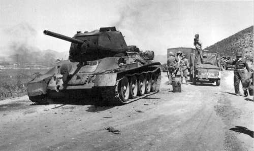 Destroyed T-34 Tank along the road during the Korean War free photo