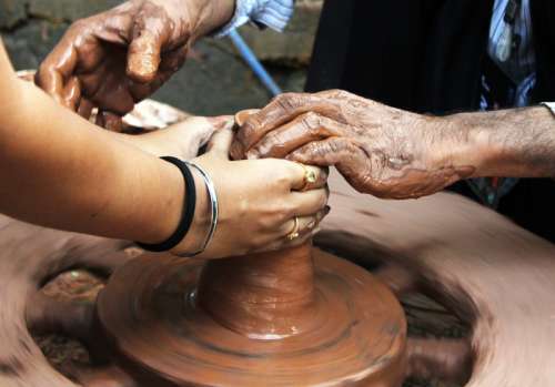 Hands Making Pottery free photo