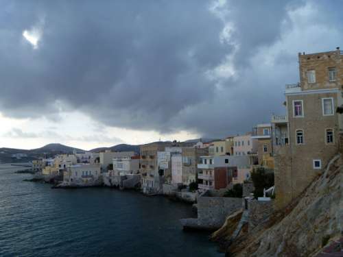 Heavy Clouds near the cliffs and coastline in Ermoupoli, Greece free photo
