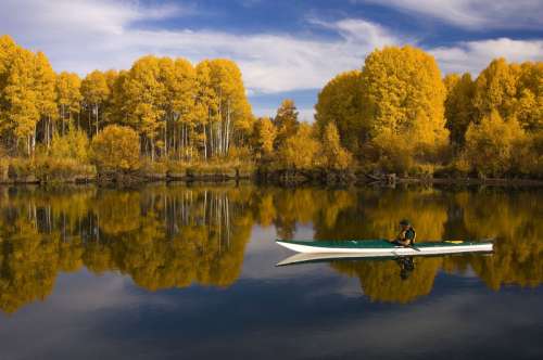 Lake, Kayaker and Landscape in the fall free photo