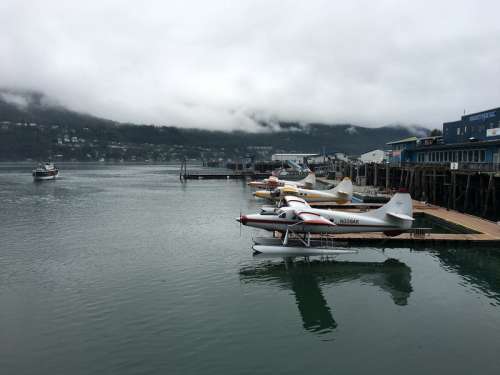 Planes in the Docks with Planes with cloudy sky in Juneau, Alaska free photo