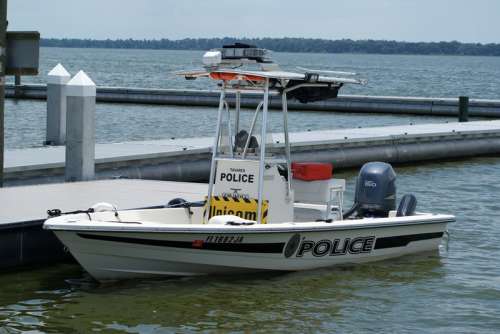 Police boat at the dock at Tavares, Florida free photo