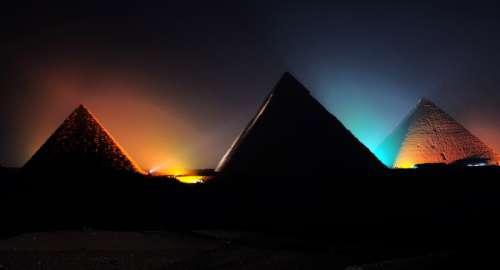 Pyramids at night in Giza, Egypt free photo